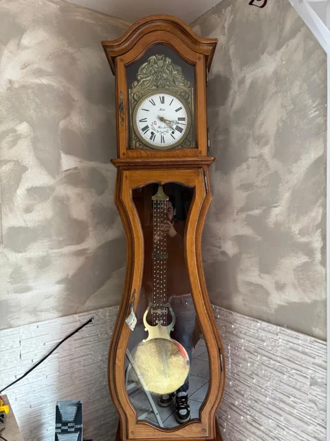 Horloge à balancier dans son meuble